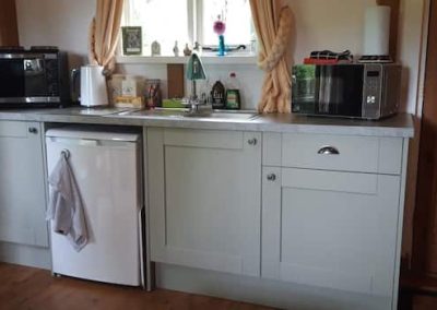 Kitchen area inside The Thatched Cottage in Bramshaw