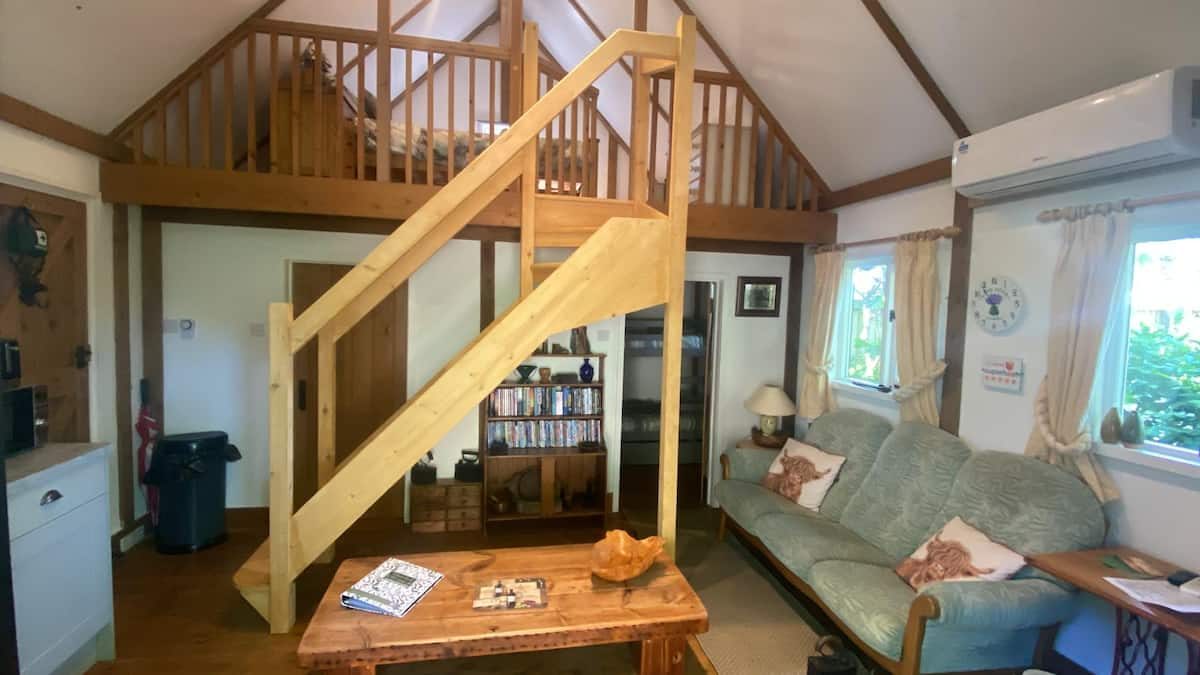 Living room inside The Thatched Cottage in Bramshaw