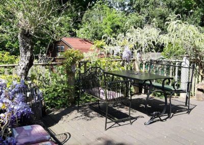 Private patio and garden at The Thatched Cottage in Bramshaw